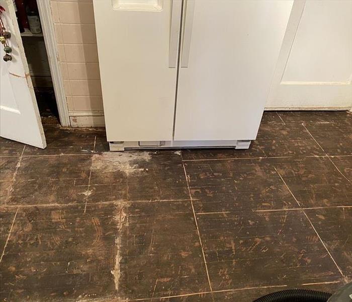 Kitchen with subfloor showing